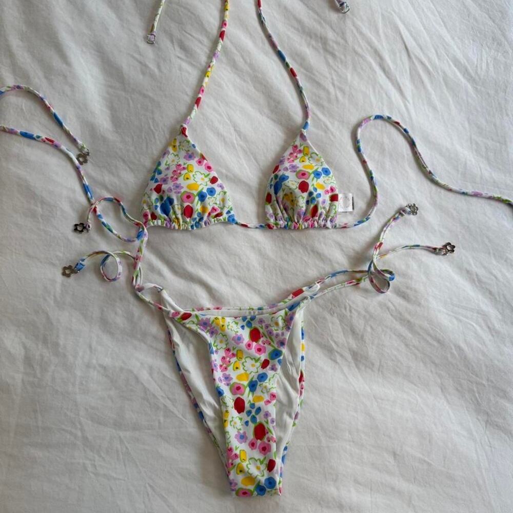 With jean white and multi colored floral print bikini set
